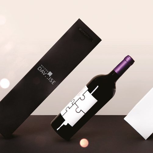 cardboard packaging for wine with bottle of red wine